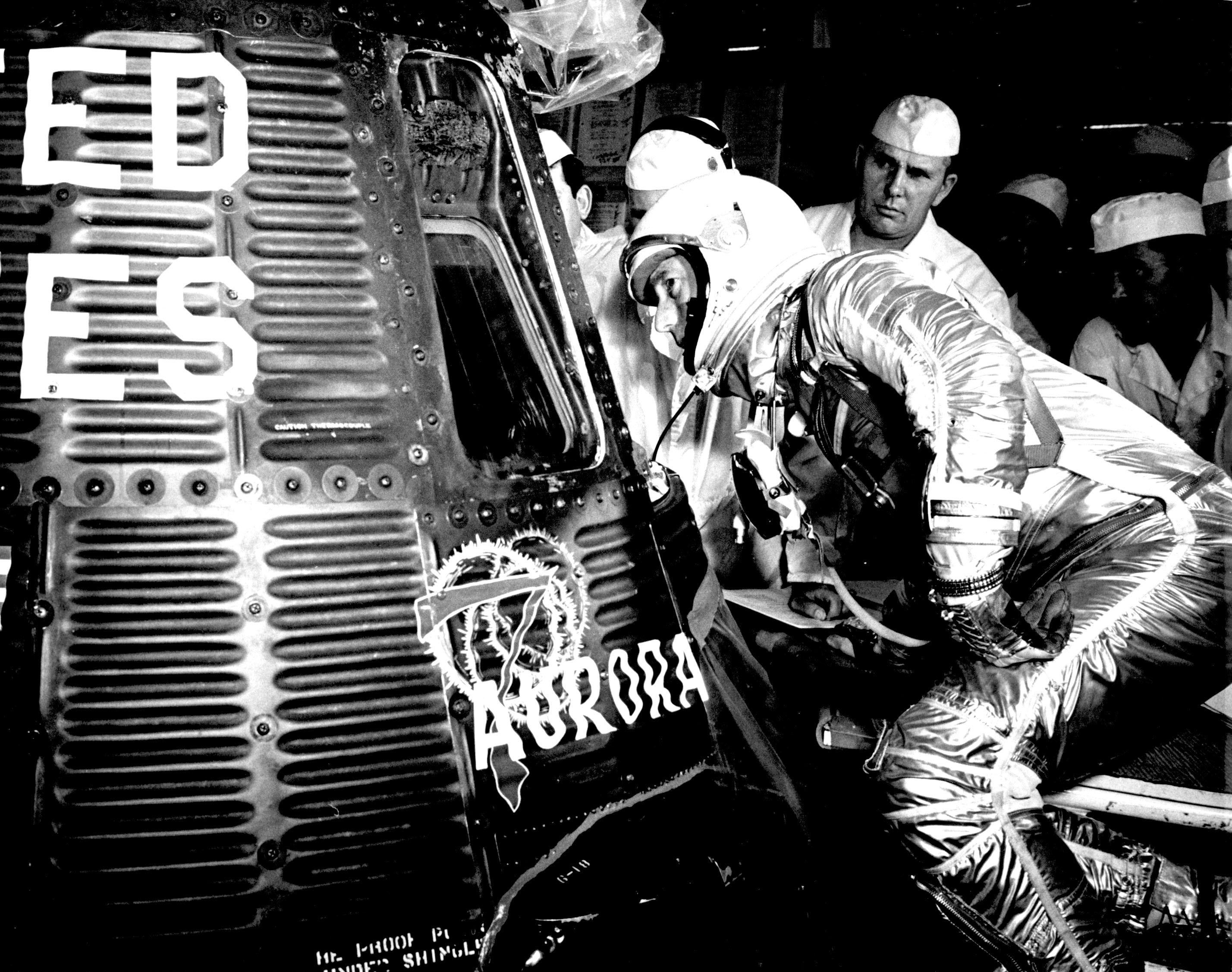 Astronaut Scott Carpenter Looking inside his Aurora 7 Spacecraft