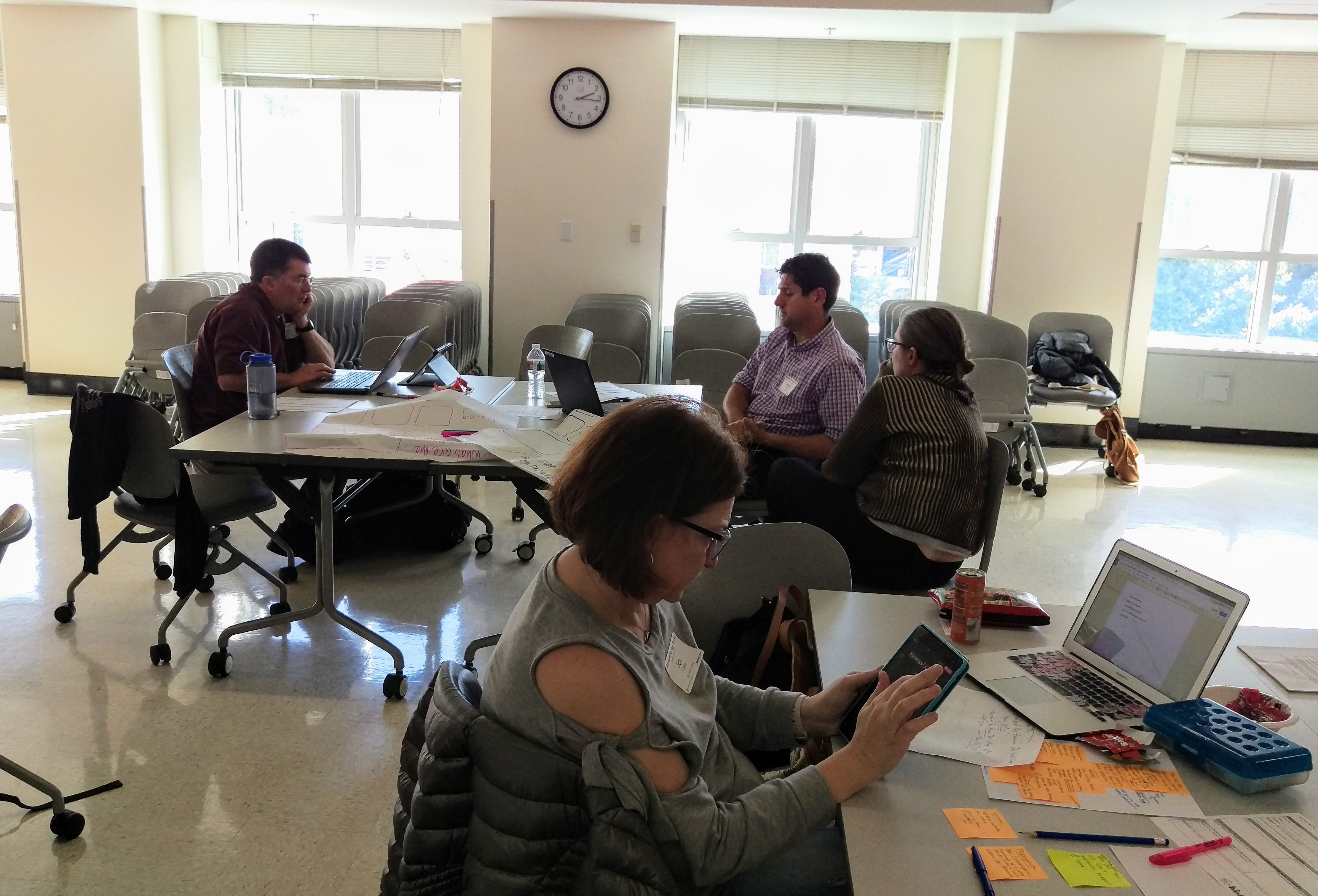 Educators working on their lesson documentation during a Remembering WWI workshop at UC Berkeley