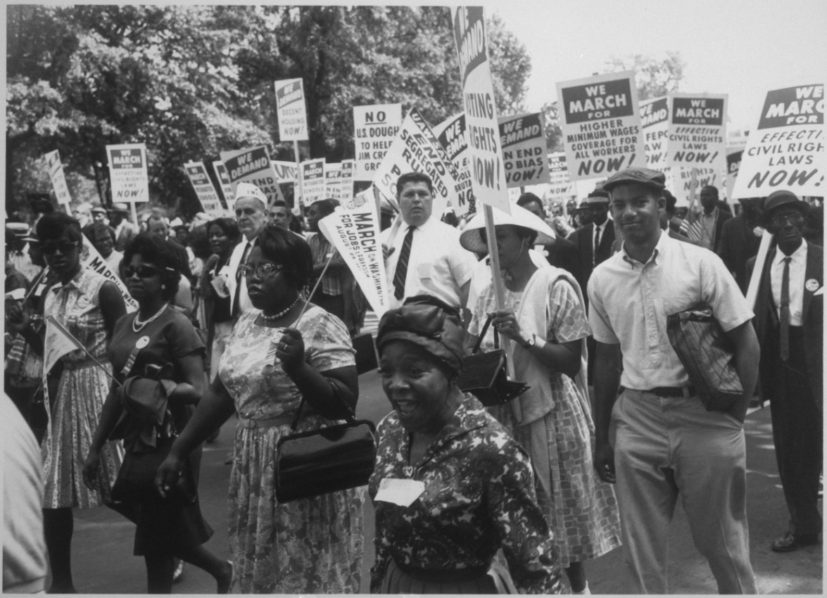 Marchers with signs